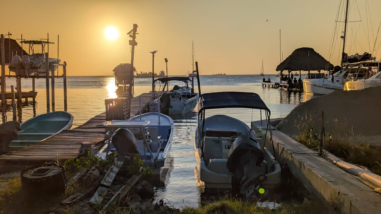 Sunset at a dock on Caye Caulker
