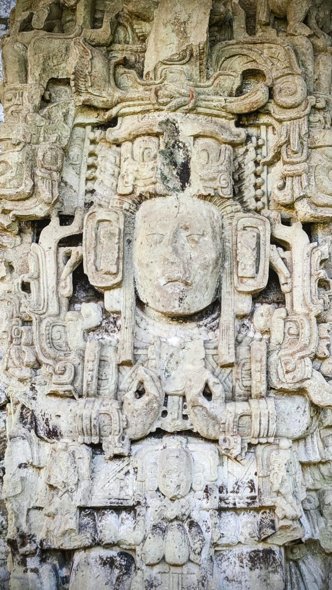 Detailed Maya stone carving at the Copan archaeological site
