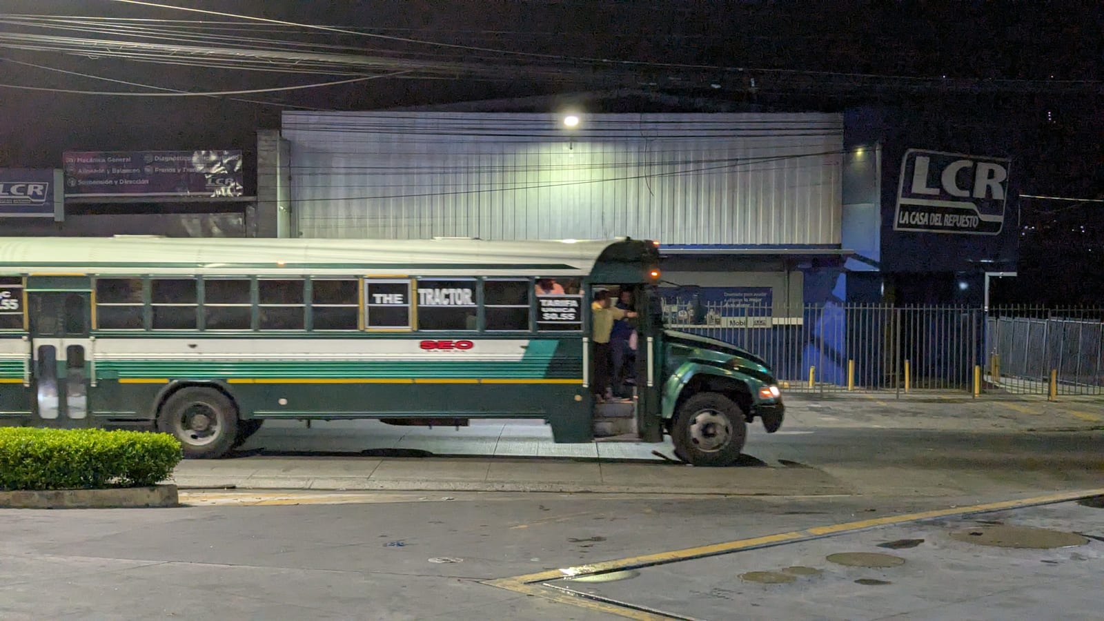 A shuttle bus waiting before dawn for the Honduras transfer