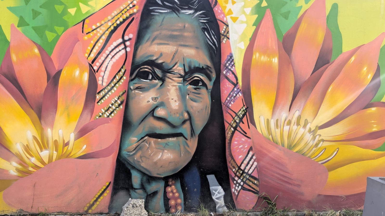 Colorful portrait mural in the Zacamil apartment complex