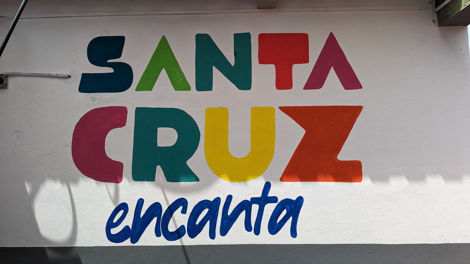 Colorful Santa Cruz Encanta sign in Puerto Ayora