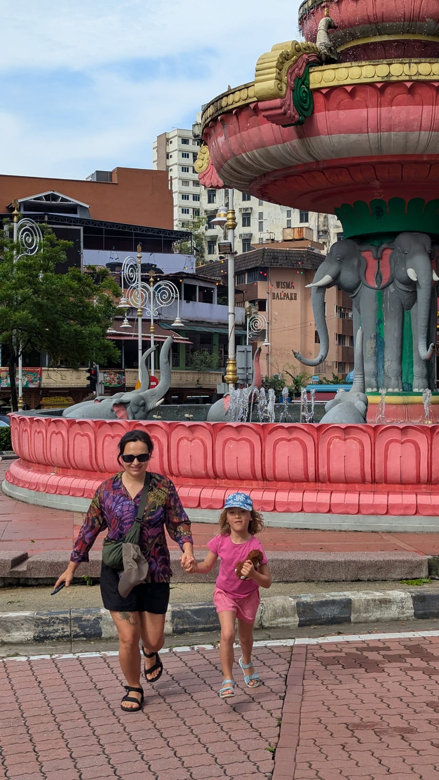 Elephant statue fountain outside a Hindu temple in Kuala Lumpur