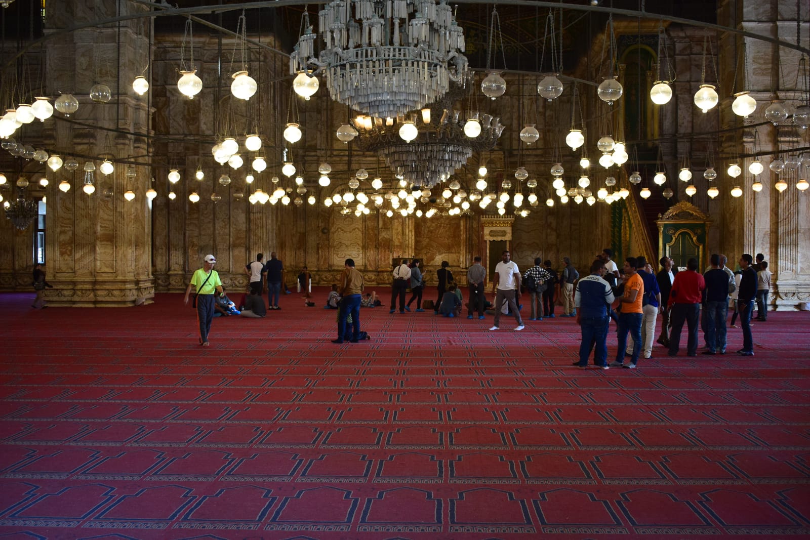 Chandeliers and domed ceiling inside Mohamed Ali Mosque