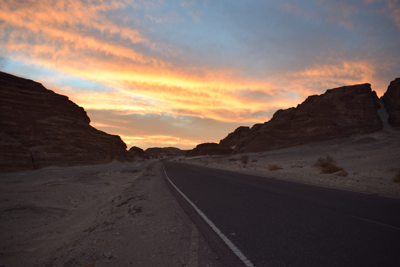 Sunset over a desert road near Nuweiba, Sinai